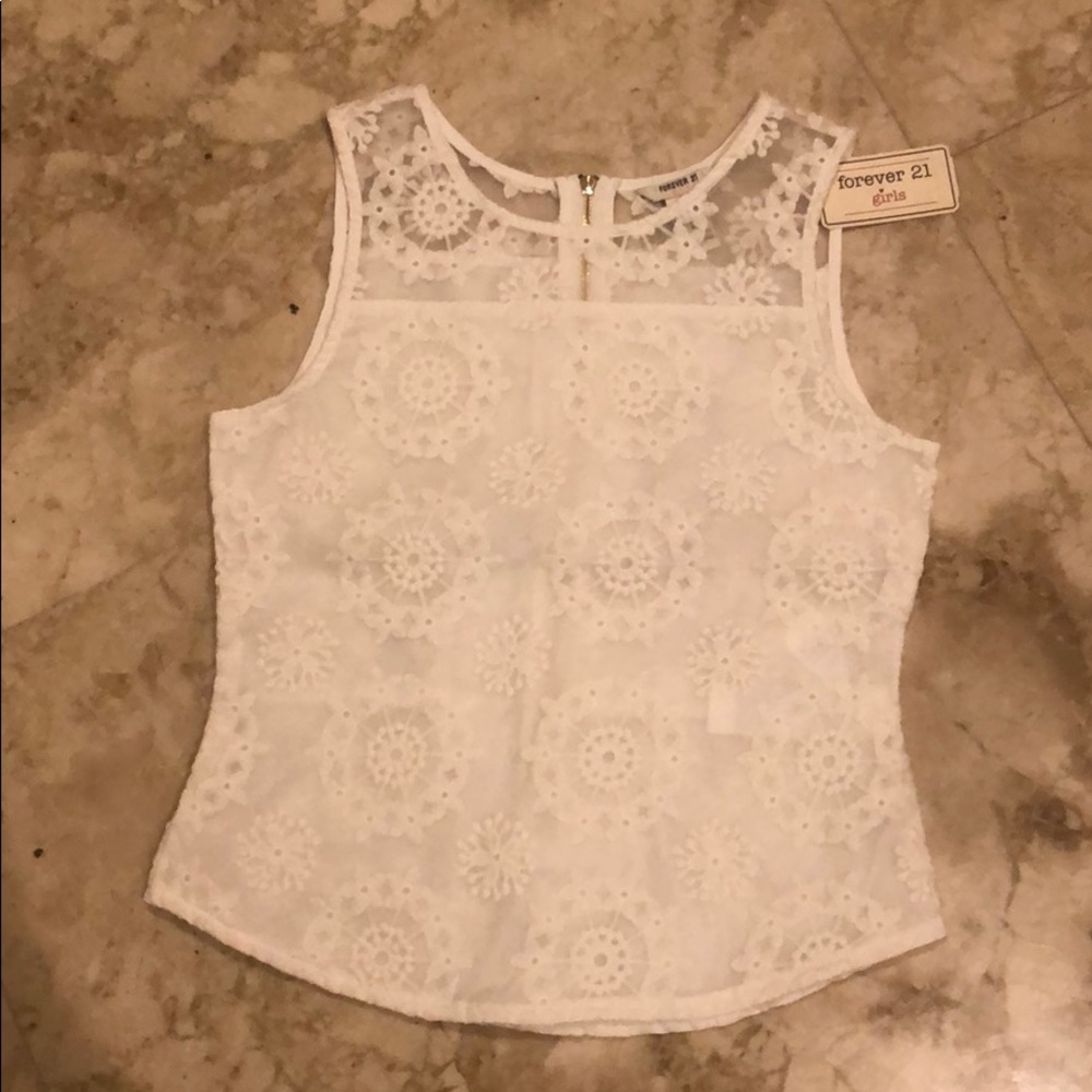 White sleeveless top